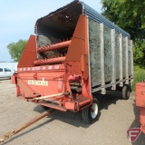 Gehl 910 14' self-unloading silage box with Gehl 10 ton running gear with implement tires