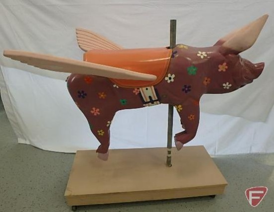 Wood carousel flying pig, mounted on pole on wood platform with wheels, 49inHx29inWx52inD