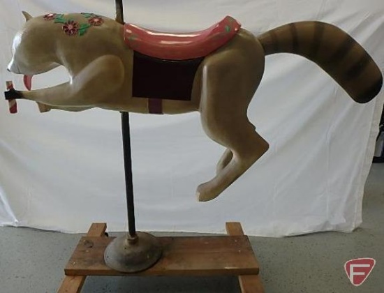 Wood carousel raccoon, mounted on pole on wood wheeled cart, 70inHx23inWx60inD