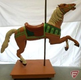 Wood carousel horse mounted on pole on wood platform with wheels, 66inHx25inWx68inD