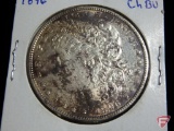 1893 Morgan Silver Dollar uncirculated, splotchy brown toning on obverse and reverse