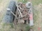Metal fencing, waterers, pick ax, hose, funnels, 1977 Iowa license plate
