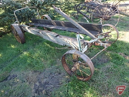 Manure spreader frame with steel wheels