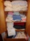 Contents of cupboard and top drawer: blankets, towels, washcloths, sheets
