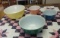 Pyrex colored nesting bowls and quilted table cover