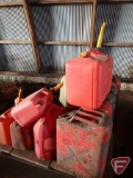 (7) jerry cans, metal oil cans, and plastic gas cans