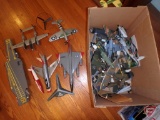 Model airplanes, airplane carrier, model bombs, some incomplete, and model boxes, may not match