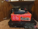 End table and contents: CB radios, HS TV, Hitachi VHS/DVD player, Panasonic cassette player,