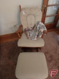 Glider rocker with gliding ottoman and blanket