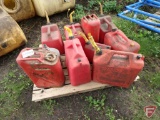 Gas cans and (2) jerry cans