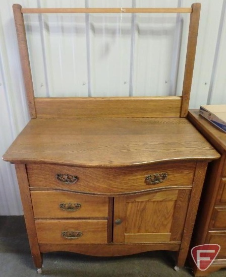 Vintage commode with towel bar, 34 in x 20 in x 51 in on wheels