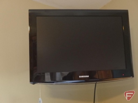 Samsung Series 8000 22in flat screen TV with remote and base on hanging swivel arm