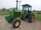 John Deere 4630 2wd diesel Quad Range tractor with cab enclosure, heat/AC, 113 hours showing (rolled