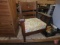 Vintage rocking chair with material covered seat pad
