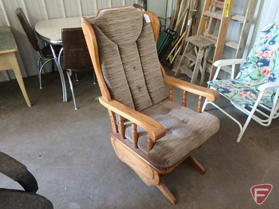Wood glider chair with upholstered cushions