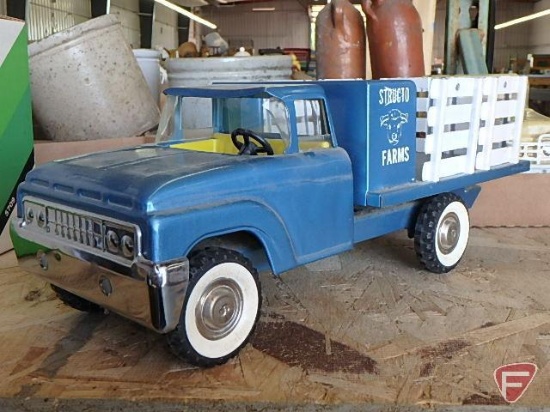 Structo Farms metal toy truck with stock sides, front windshield is broke