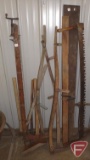 Scythes, two man saw, blade with wood handle, wood vise, pick, scoop
