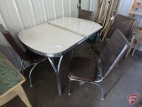 Vintage metal table with formica top and (4) metal chairs with vinyl upholstery.