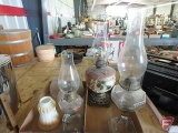 (3) hurricane oil lamps and 4 globes, not all matching, Both boxes