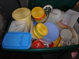 Tupperware and other plasticware in tote with cover