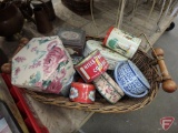 Wicker basket with decorative tins and fabric covered boxes