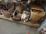 Assortment of wicker baskets and containers, various styles and sizes, picnic baskets