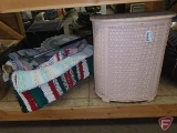 Pink hamper, homemade rugs, clothes pins, bathroom scale