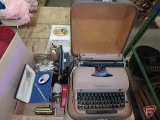 Remington typewriter, box of office supplies