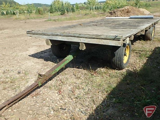 8'X18' plywood flatbed on John Deere heavy duty wagon with flotation tires and