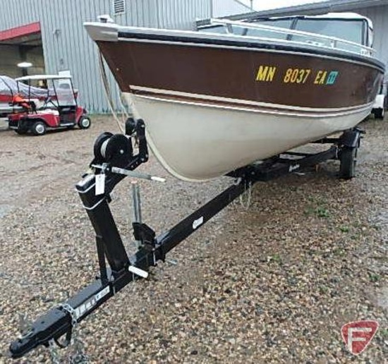 1979 Lund 17 ft. boat with 115hp Evinrude outboard and 6hp Johnson kicker motors and Spartan trailer