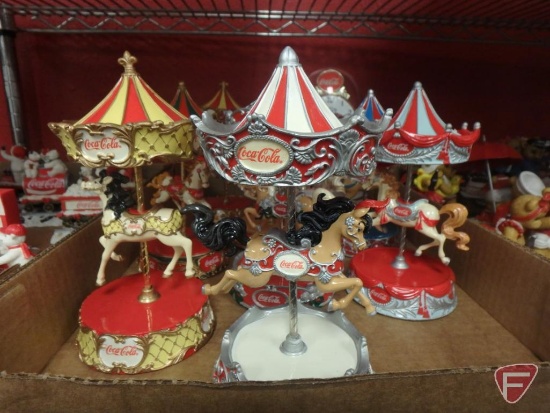 Coca-Cola items, lighted village pieces, carousel figurines, battery-operated anniversary