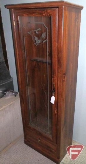 Wood 6 gun cabinet with etched glass door. Locking door and bottom compartment. Has keys.