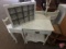 Wood wall display cabinet with glass door, 20inx16inx3in, and painted wood table with 1 drawer,