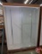 Lighted display case with glass shelves and glass sliding doors 72inHx48inWx16inD
