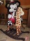 Wood giraffe rocking toy and plush firefighter bear. Both pieces