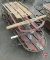 (3) wood and metal sleds, longest is 54inL. 3 pieces