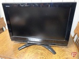 Toshiba Regza 32in flat screen television on stand, Model 32LV67U, with built in DVD player,
