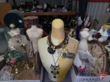 Decorative forms, jewelry display bust with necklaces and pins, candle holders
