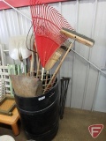 Yard/Garden tools, rakes, broom, shovels, pitchfork, yard sticks, hoe, and metal legs.