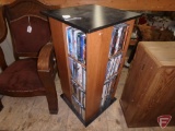 Wood 4-sided media storage cabinet, 37inHx19inx19in, with assortment of DVD movies,