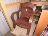 Vintage wood chair with upholstered back and seat with nail head trim