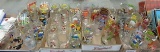 Novelty glasses, Smurfs, ET, Peanuts and more. Contents of 4 boxes