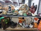 Plastic and rubber Halloween decorations. Everything on table and below table.