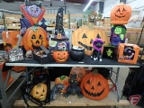 Plastic, rubber, metal and resin Halloween decorations, some lighted,.