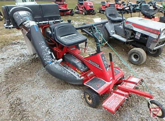 Snapper 10 HP 28" rear engine rider with collection system and thatcher