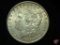 1885 O Morgan Silver Dollar with pretty reverse toning AU