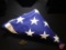 US burial flag and 3 shell casings