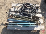 electrical cable, post hole digger, and bumper jacks