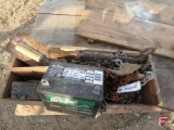 Batteries and chain, nail puller, hammer, and cement trowels