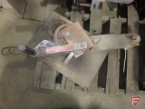 Manual winch mounted to bracket